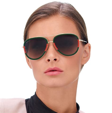 emerald green gucci sunglasses|gg0062s 003.